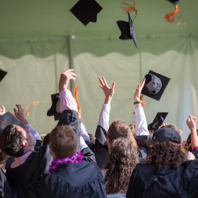 Image of graduation, linking to commencement